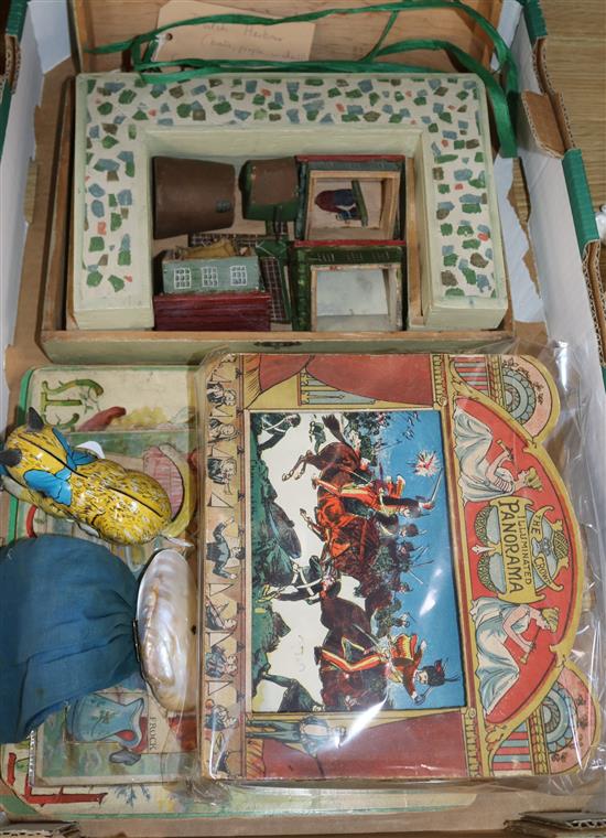 A collection of Victorian and later childrens toys, including The Crown Illuminated Panorama,